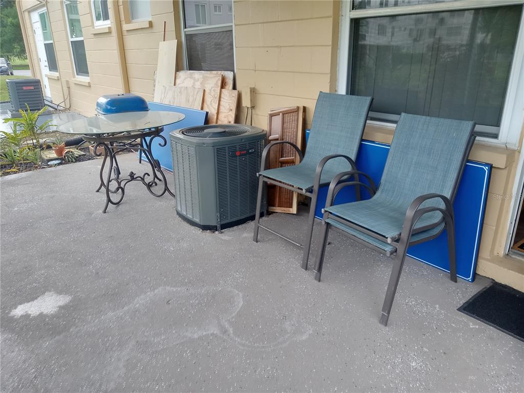 2467 Finlandia Lane, Unit 27 Clearwater, FL 33763 - Photo 38 of 58 a view of a dining room with furniture window and outside view