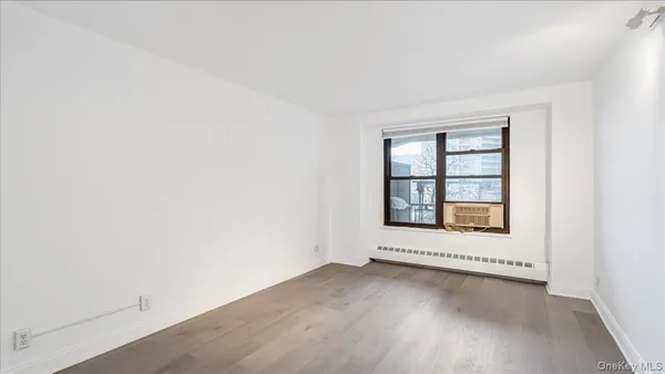 an empty room with a window