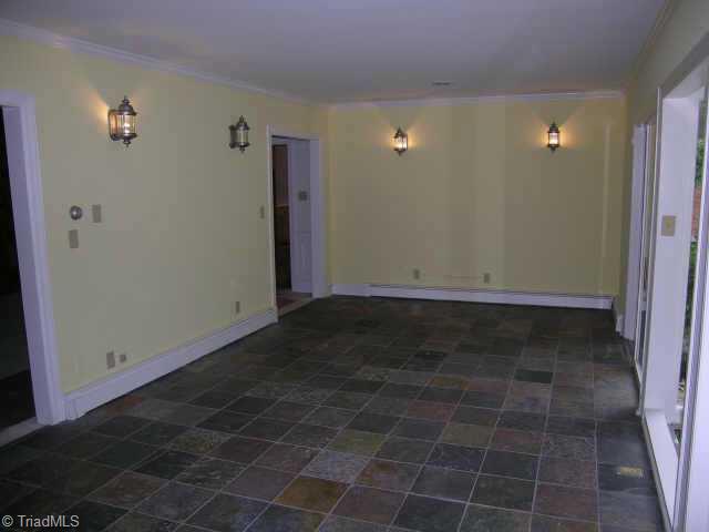 Other. Sunroom with slate flooring