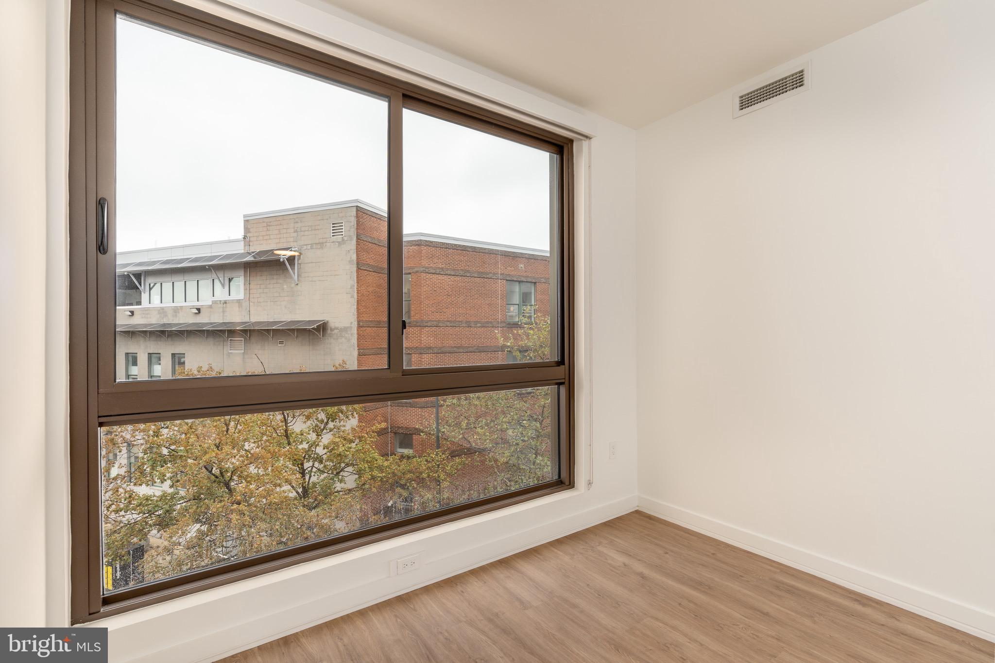 1630 Columbia Road Northwest, Unit 407 Washington, DC 20009 - Photo 4 of 22 Living area view
