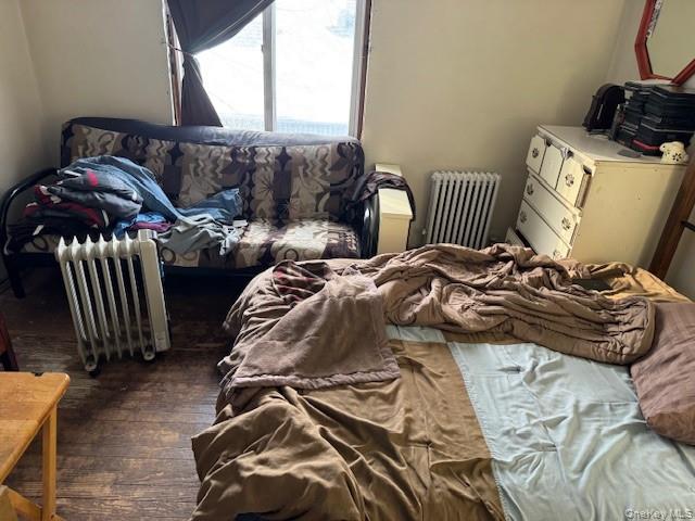 2122 Walnut Street Baldwin, NY 11510 - Photo 13 of 32 a bedroom with two beds and a couch