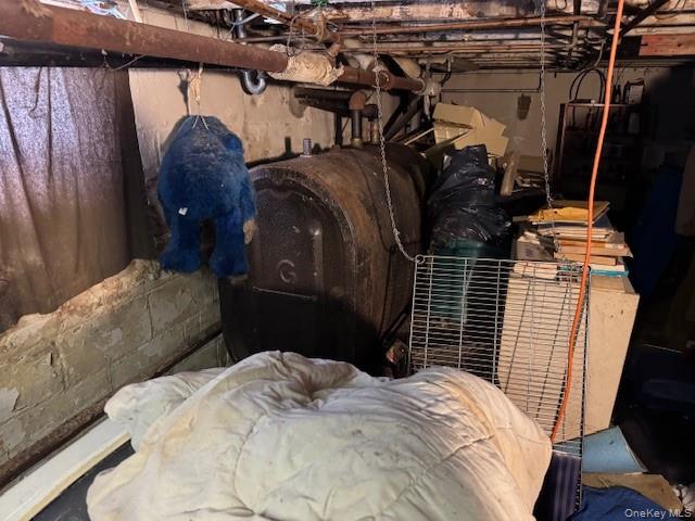 2122 Walnut Street Baldwin, NY 11510 - Photo 22 of 32 a bedroom with bed and wooden floor