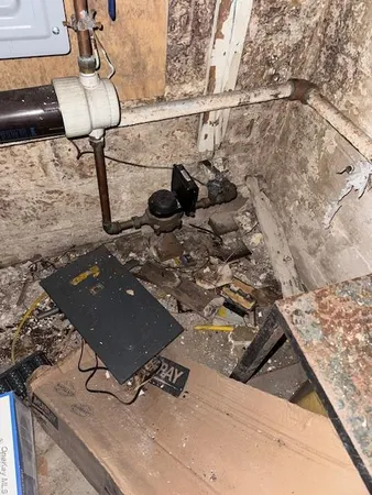 a view of a house with snow on the roof