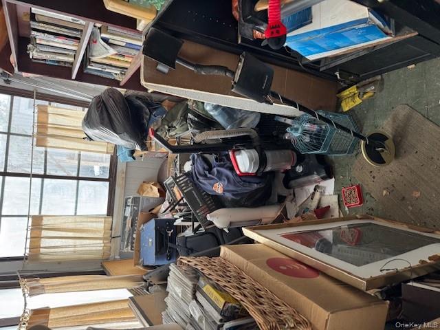 2122 Walnut Street Baldwin, NY 11510 - Photo 32 of 32 a view of walk in closet with clothes and shoes