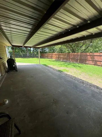 a view of a backyard of a house