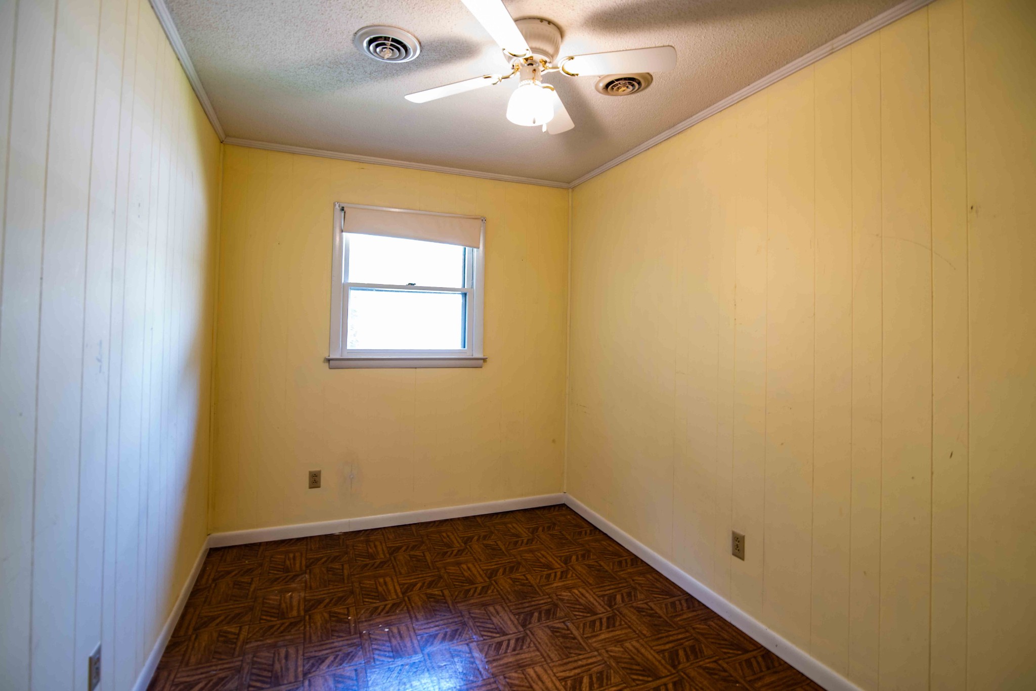 108 Fleming Street Tullahoma, TN 37388 - Photo 17 of 24 a view of a hallway with a chandelier fan and wooden floor