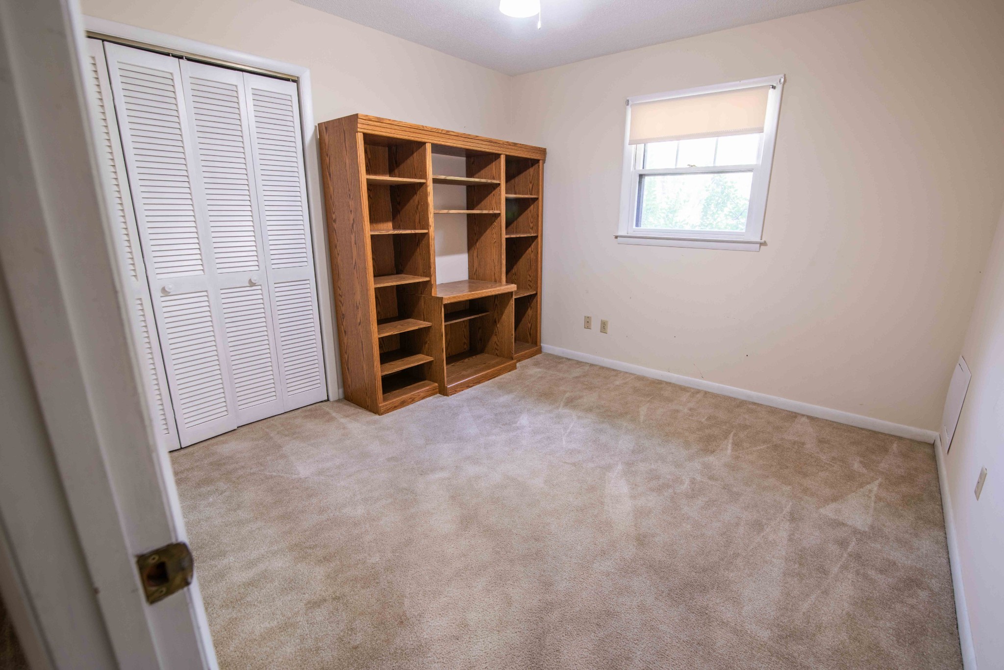 108 Fleming Street Tullahoma, TN 37388 - Photo 19 of 24 an empty room with walk in closet and window