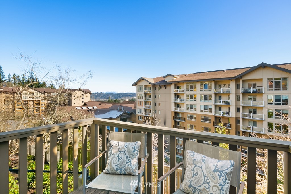 70 Cougar Ridge Road Northwest, Unit 2004 Issaquah, WA 98027 - Photo 6 of 27 a view of a building from a balcony