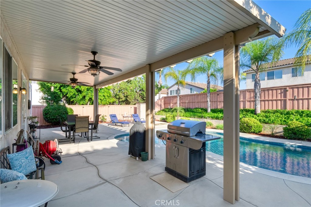 20885 Bakal Drive Riverside, CA 92508 - Photo 32 of 47 a building outdoor space with patio furniture and potted plants