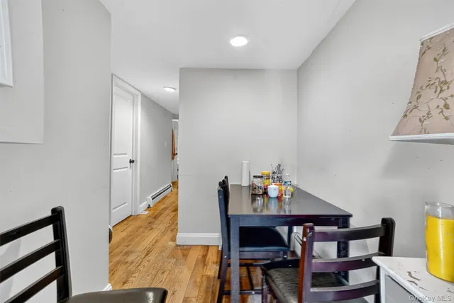 a view of workspace with wooden floor