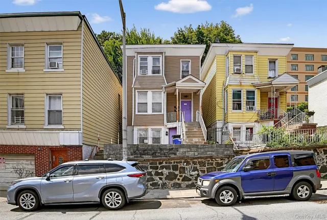 a view of a building with sitting area