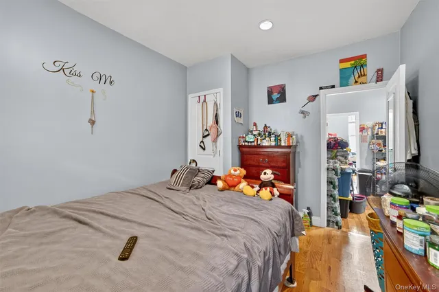 a bed room with a bed and a desk