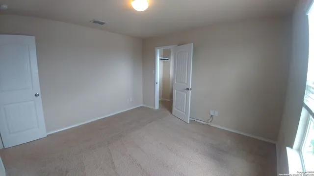 an empty room with windows