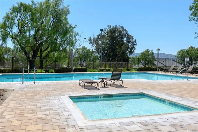a view of a park with sitting area