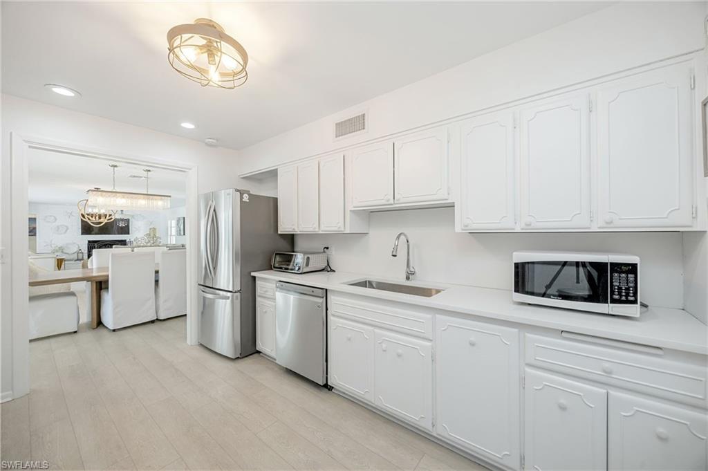 2728 Crayton Road Naples, FL 34103 - Photo 13 of 35 Gallery Image 13