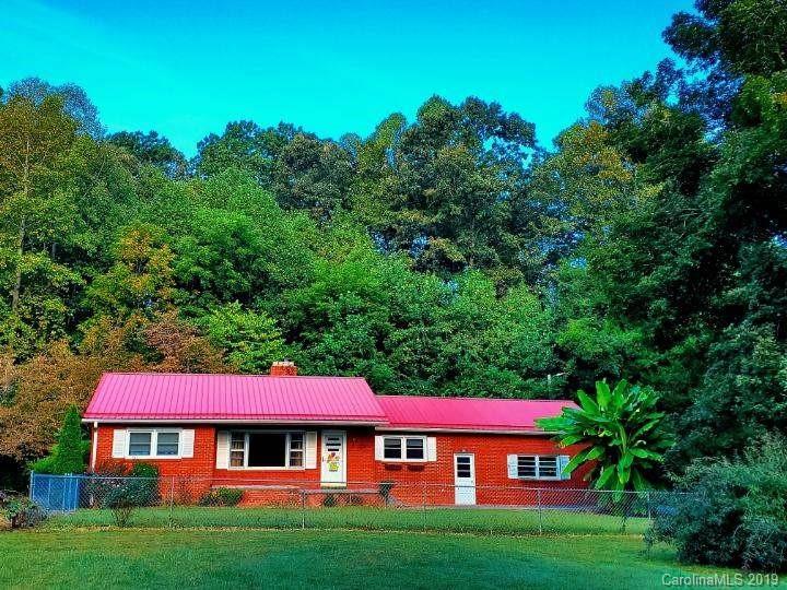849 Fairview Road Marion, NC 28752 - Photo 1 of 15 a front view of a house with yard and green space