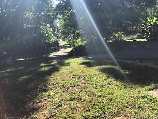 849 Fairview Road Marion, NC 28752 - Photo 11 of 15 a view of a pathway both side of yard