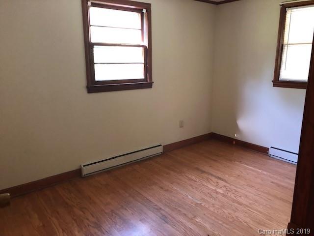 849 Fairview Road Marion, NC 28752 - Photo 7 of 15 an empty room with a window