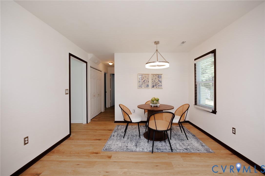 20520 Cox Road Sutherland, VA 23885 - Photo 7 of 31 Wood-finish flooring throughout, bright white wall