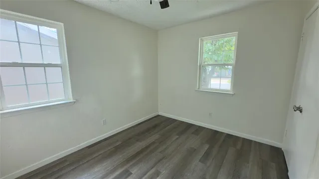 an empty room with windows