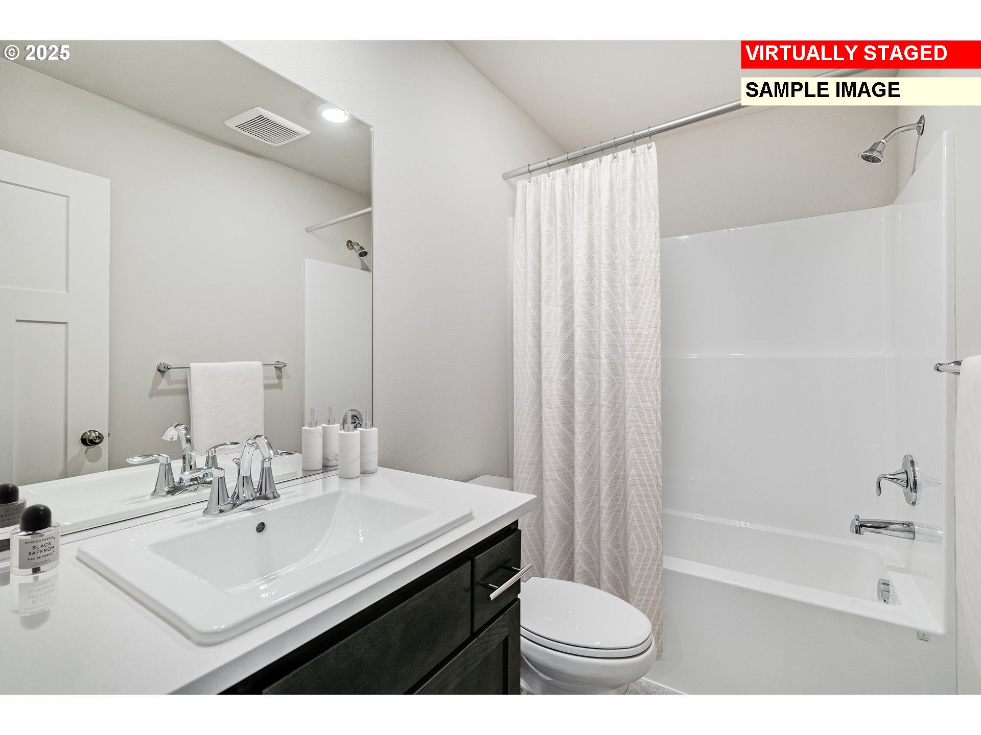 3250 Misty Lane Forest Grove, OR 97116 - Photo 15 of 23 a bathroom with a sink a toilet a mirror and shower