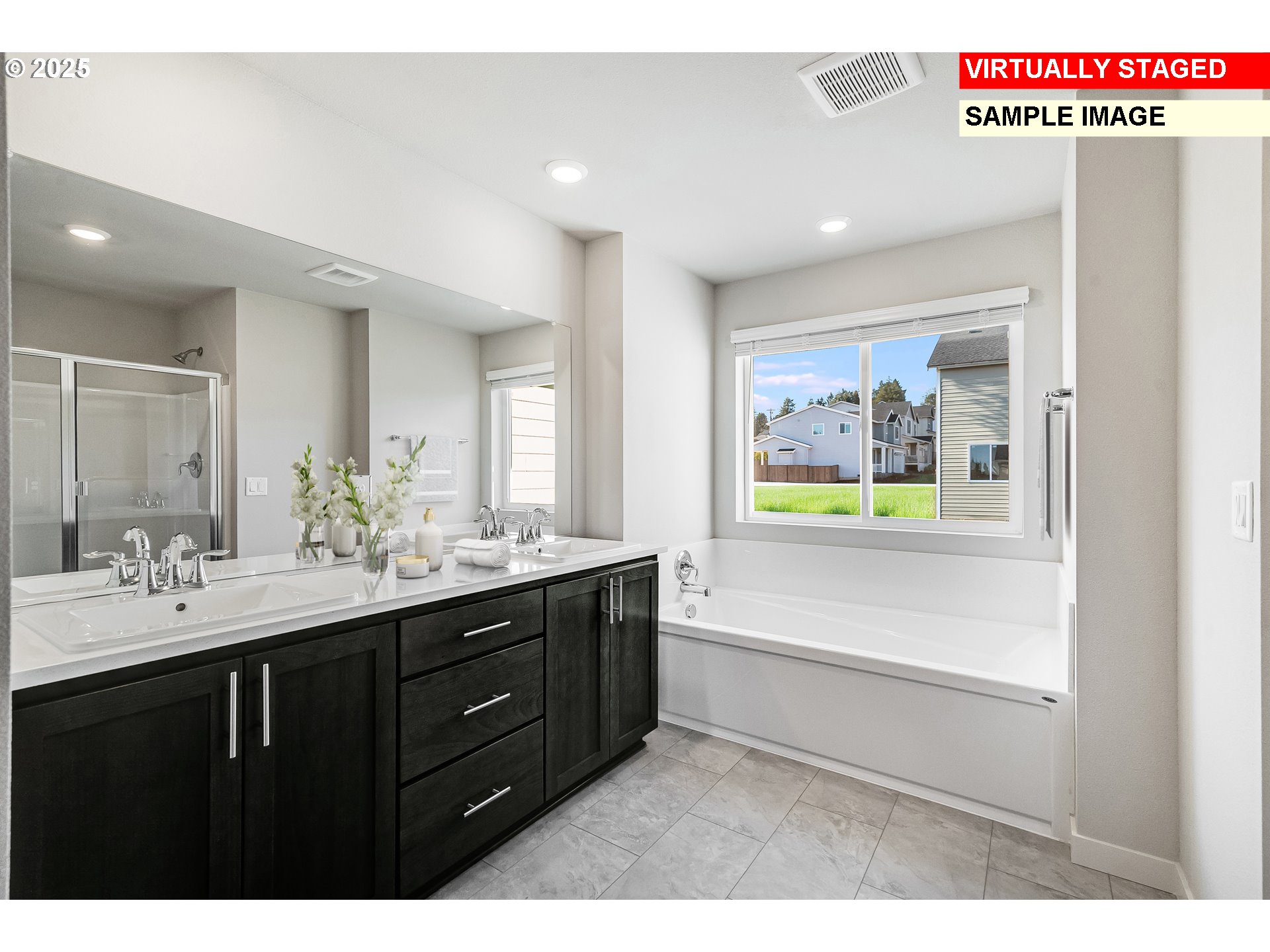 3250 Misty Lane Forest Grove, OR 97116 - Photo 10 of 23 a bathroom with a sink a mirror and a bathtub