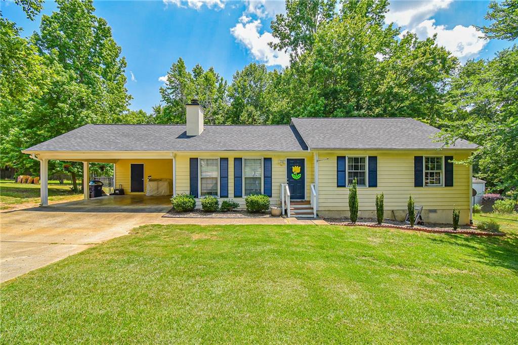 113 Hunters Crossing Road Athens, GA 30606 - Photo 1 of 1 a front view of a house with a garden