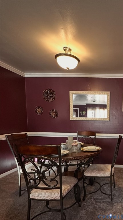 4018 Norborne Road Richmond, VA 23234 - Photo 3 of 15 Dining area with dark colored carpet and ornamenta