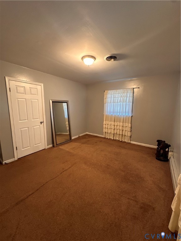 4018 Norborne Road Richmond, VA 23234 - Photo 5 of 15 Unfurnished room featuring carpet flooring and a b