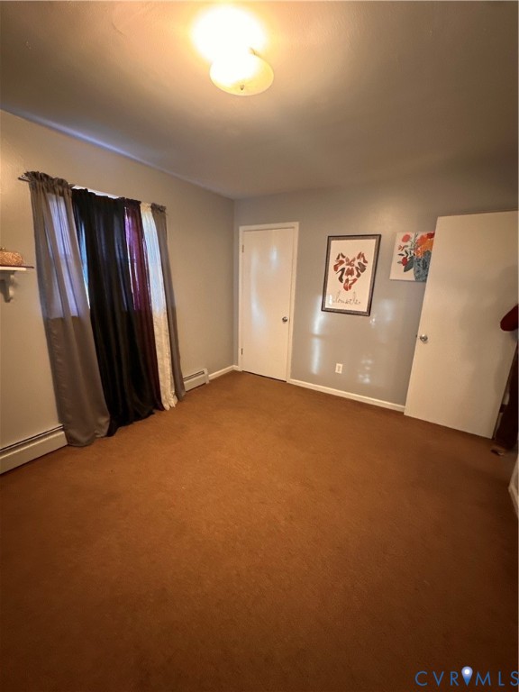 4018 Norborne Road Richmond, VA 23234 - Photo 7 of 15 Carpeted empty room featuring baseboard heating