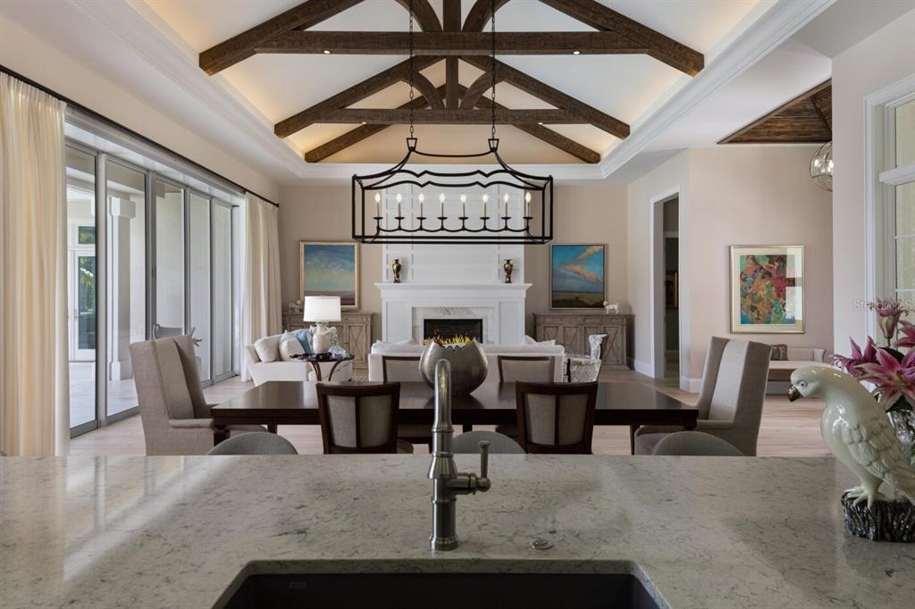 19062 Via Messina Way Miromar Lakes, FL 33913 - Photo 6 of 15 a living room with furniture and a fireplace