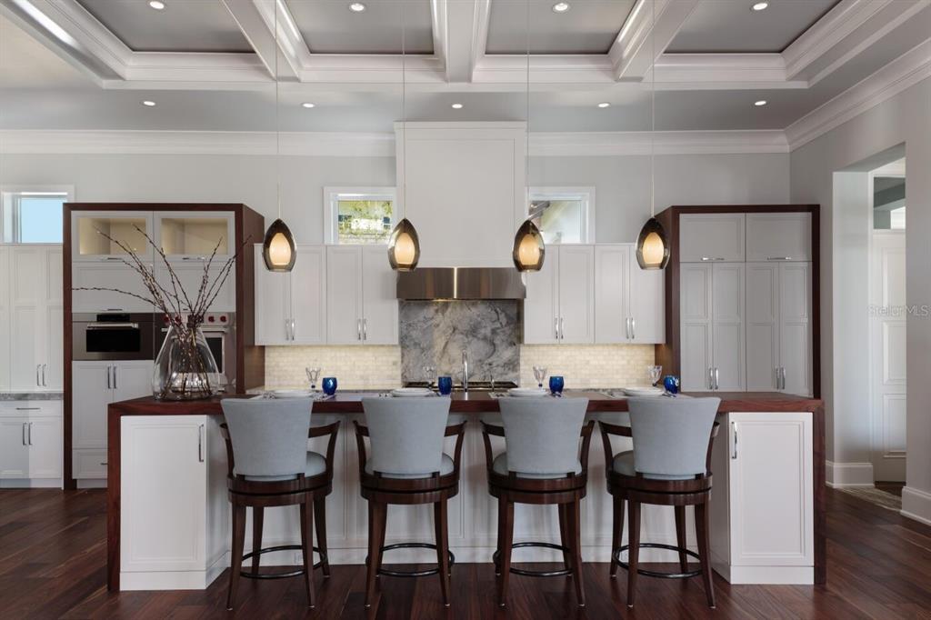 19062 Via Messina Way Miromar Lakes, FL 33913 - Photo 7 of 15 a view of a dining room with furniture and wooden floor
