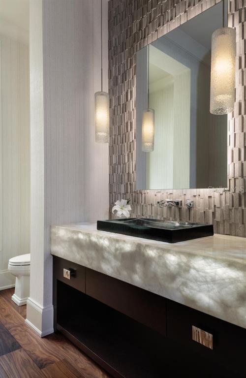 19062 Via Messina Way Miromar Lakes, FL 33913 - Photo 9 of 15 a bathroom with a sink and a mirror