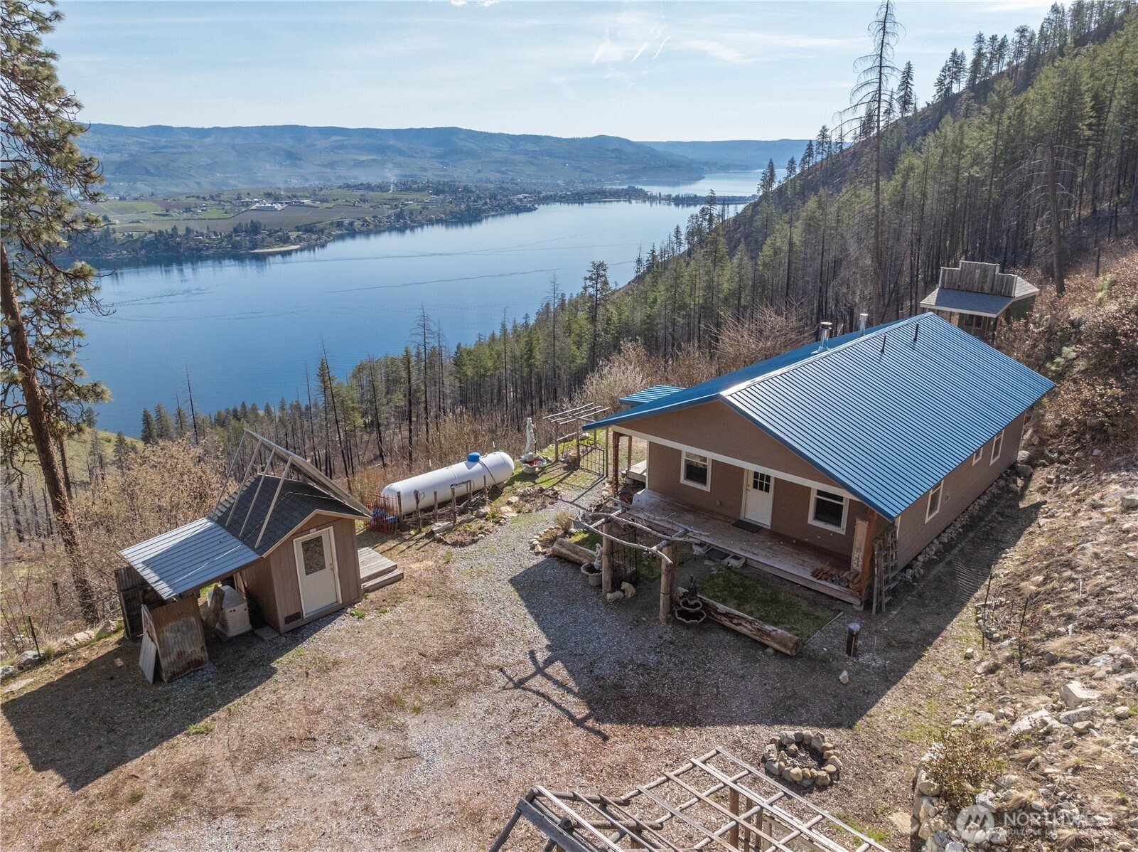 109 Granite Falls Road Chelan, WA 98816 - Photo 4 of 22 a view of a terrace with a yard