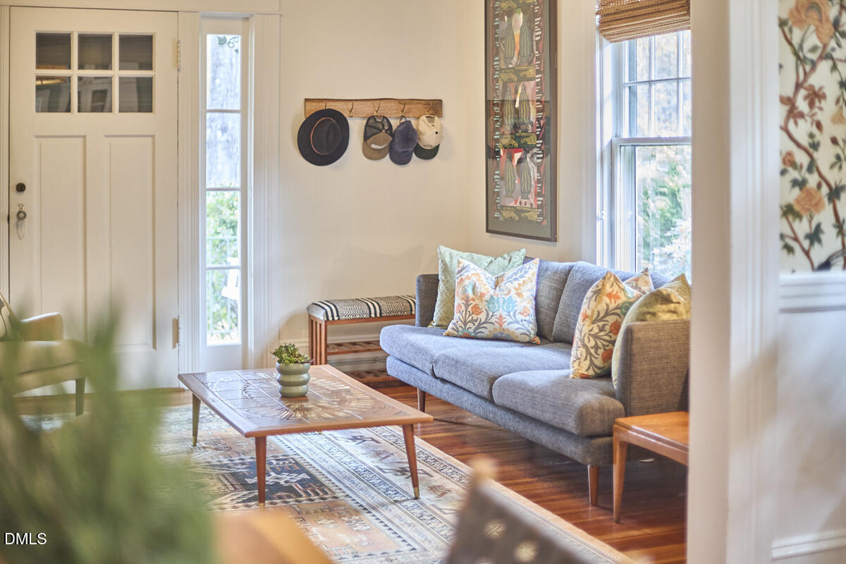 1313 Watts Street Durham, NC 27701 - Photo 11 of 44 a living room with furniture and a window