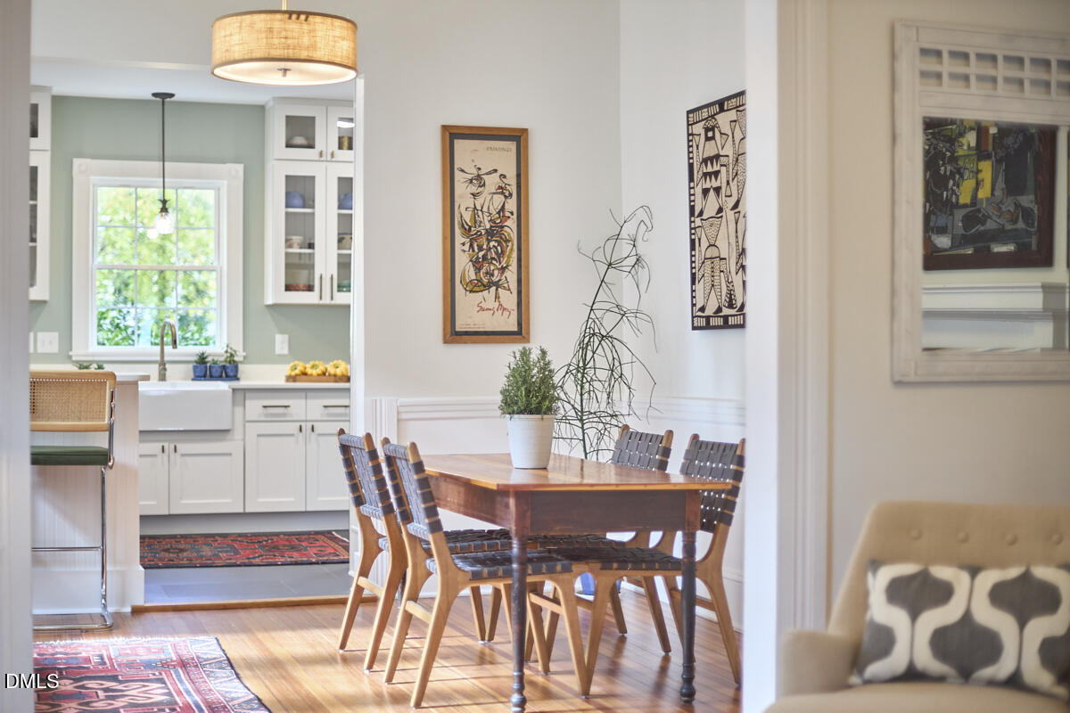 1313 Watts Street Durham, NC 27701 - Photo 12 of 44 a dining room with furniture and window