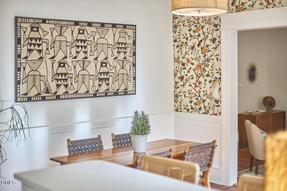 1313 Watts Street Durham, NC 27701 - Photo 15 of 44 a living room with furniture and a potted plant