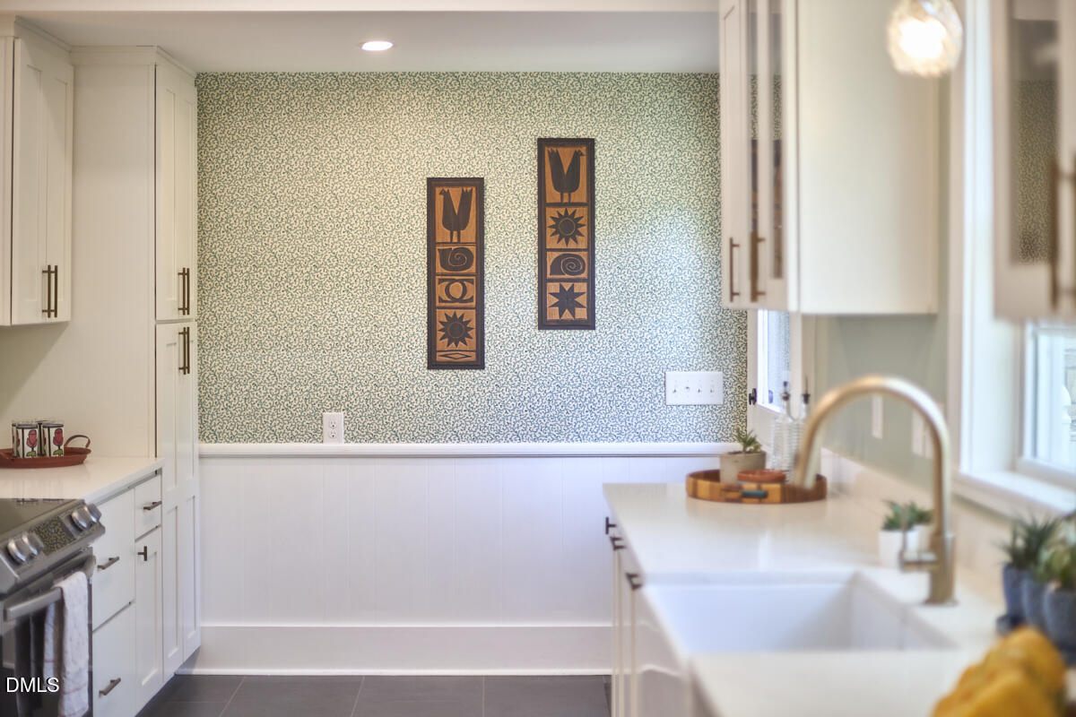 1313 Watts Street Durham, NC 27701 - Photo 20 of 44 a bathroom with a sink and a bathtub
