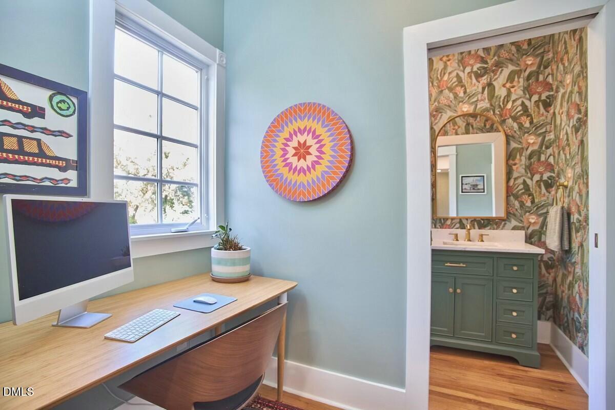 1313 Watts Street Durham, NC 27701 - Photo 23 of 44 a workspace with furniture and window