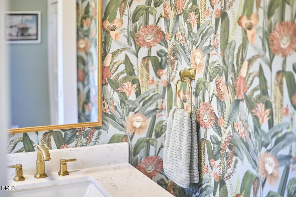 1313 Watts Street Durham, NC 27701 - Photo 25 of 44 a bath tub sitting next to a white curtain