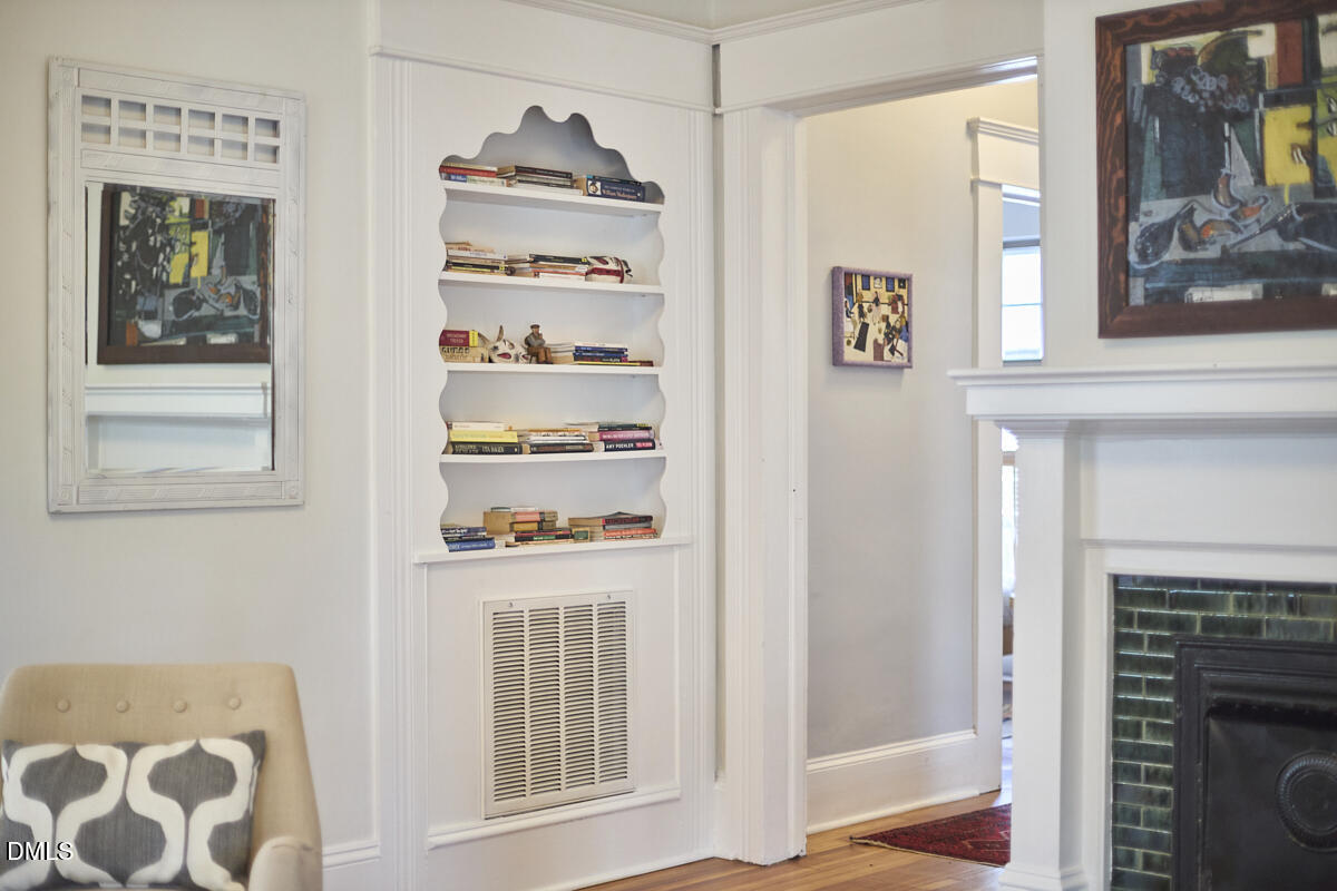 1313 Watts Street Durham, NC 27701 - Photo 26 of 44 a view of walk in closet with clothes and shoes