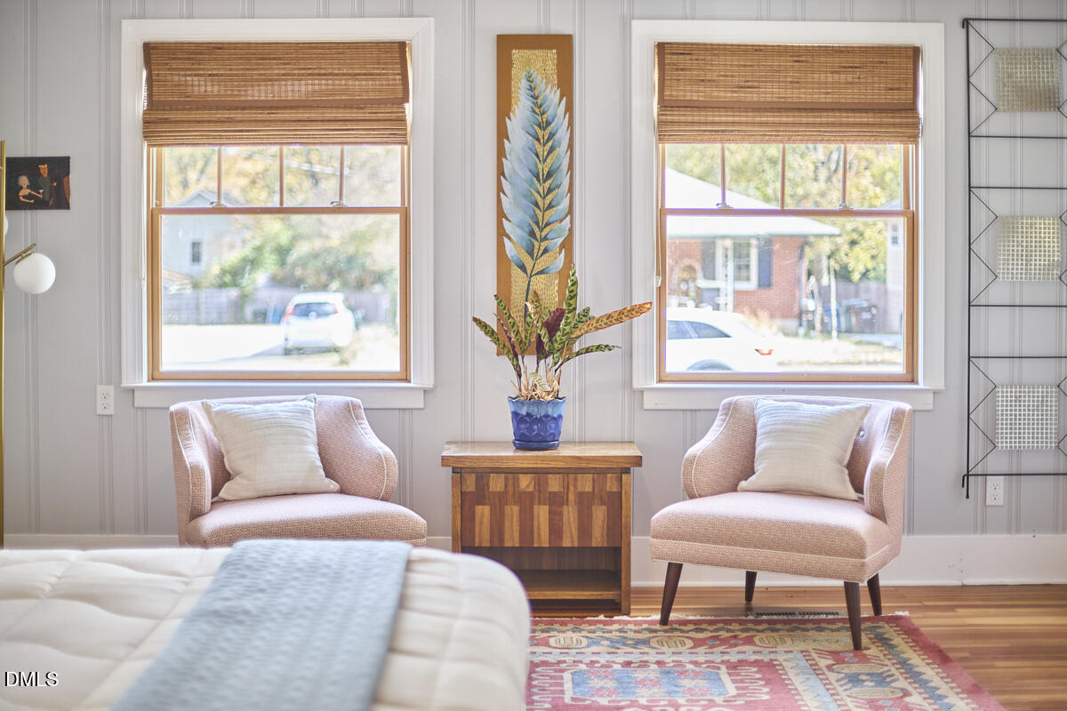 1313 Watts Street Durham, NC 27701 - Photo 29 of 44 a living room with furniture and a window