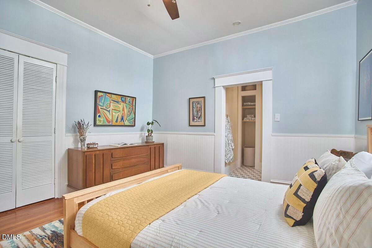 1313 Watts Street Durham, NC 27701 - Photo 35 of 44 a bedroom with a bed and furniture