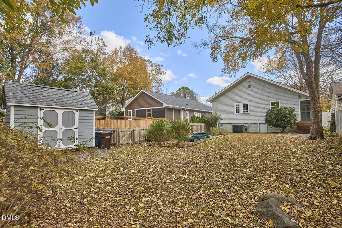1313 Watts Street Durham, NC 27701 - Photo 39 of 44 a front view of a house with a yard