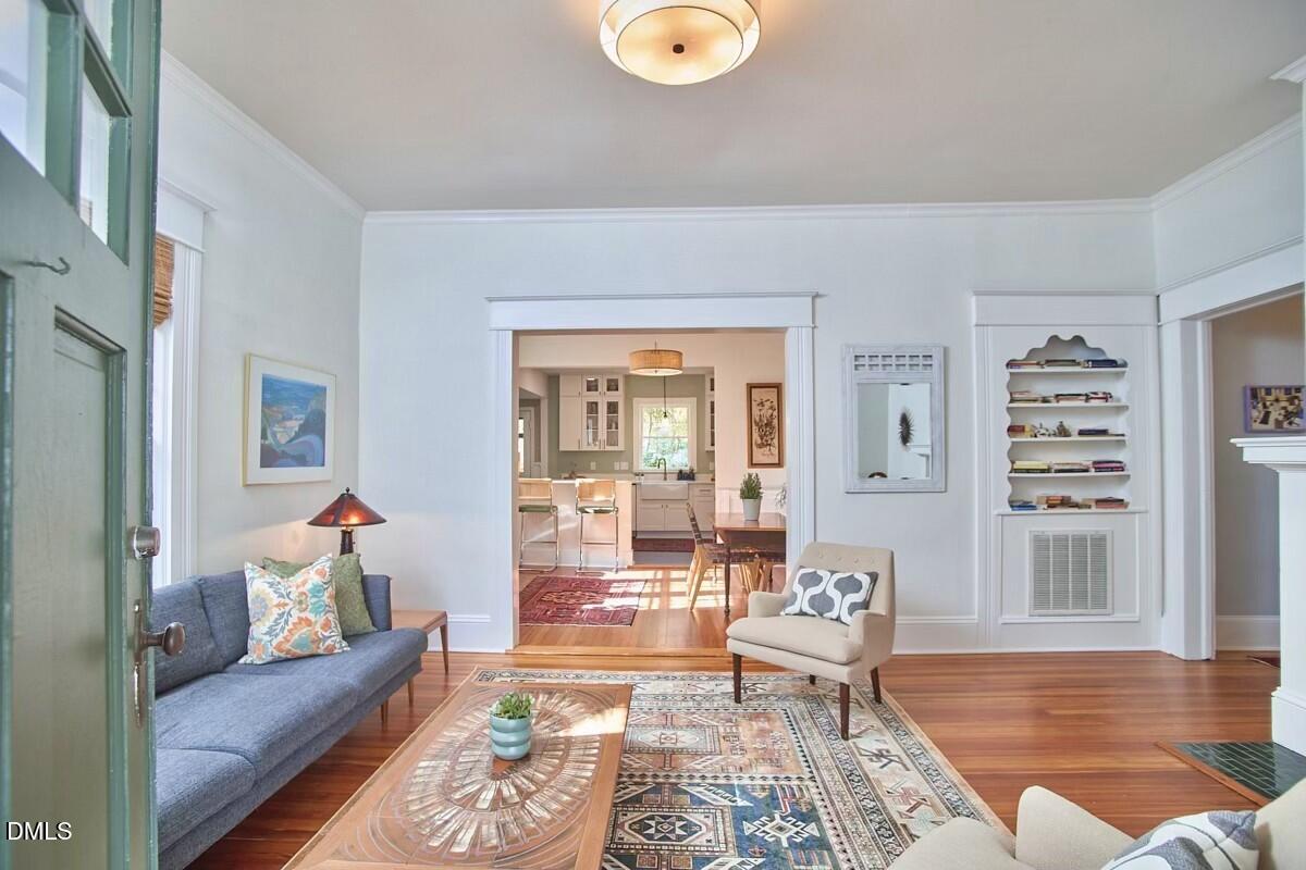 1313 Watts Street Durham, NC 27701 - Photo 5 of 44 a living room with furniture and a large window