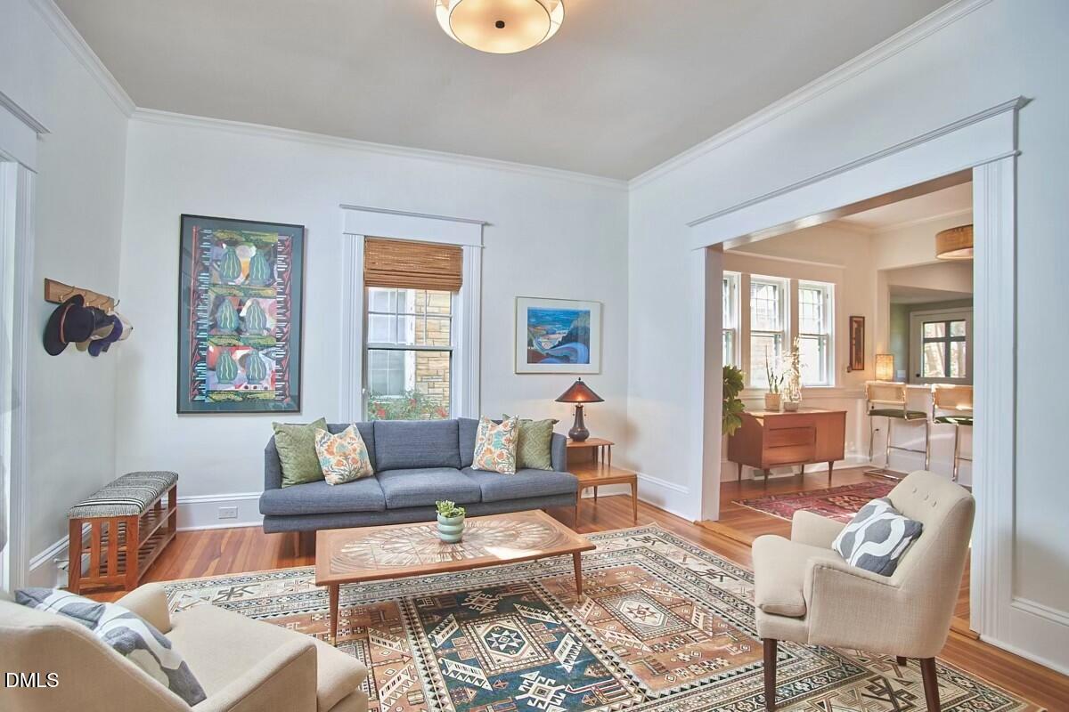 1313 Watts Street Durham, NC 27701 - Photo 9 of 44 a living room with furniture and a window
