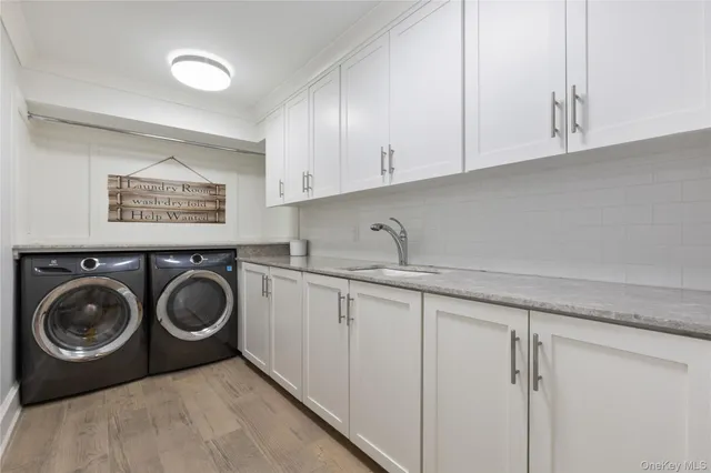 a bathroom with a sink a mirror and a shower