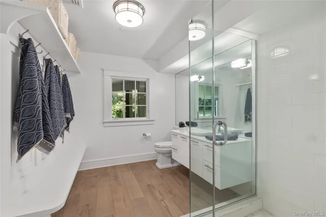 a front view of a house with a yard table and chairs