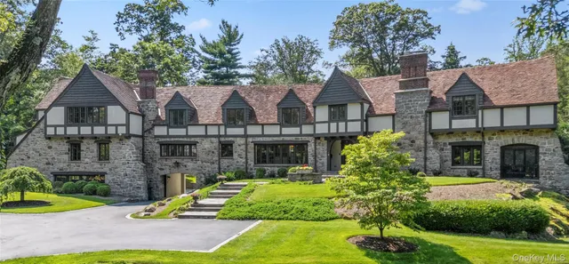 a view of swimming pool with an outdoor space and seating area