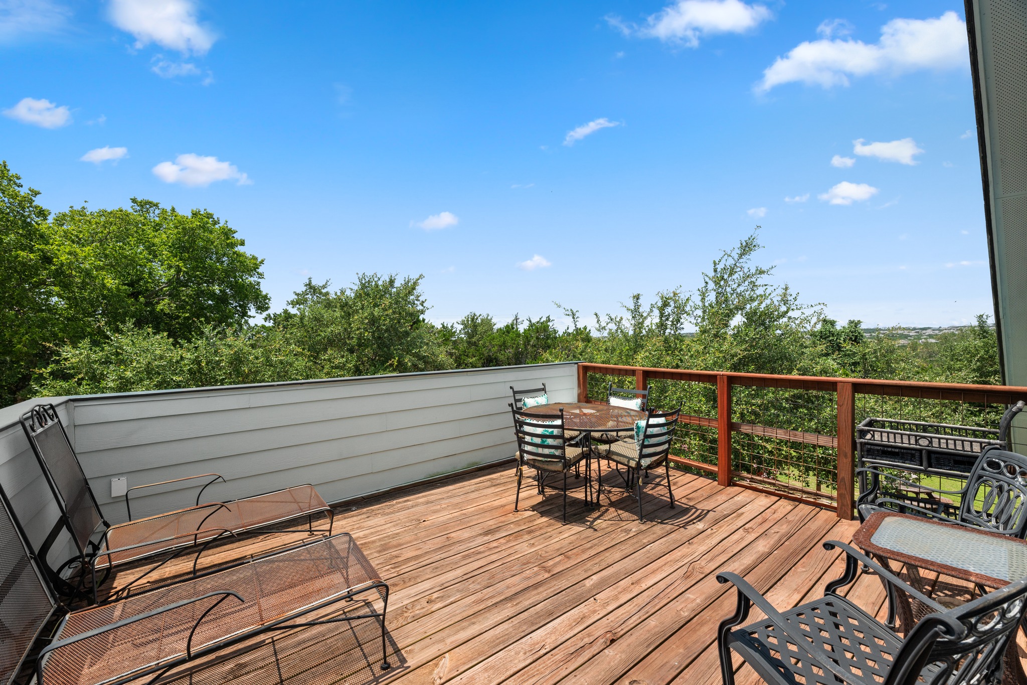 12932 Nutty Brown Road Austin, TX 78737 - Photo 11 of 40 The Manor - Private upper-level balcony overlooking the scenic property and mature trees.